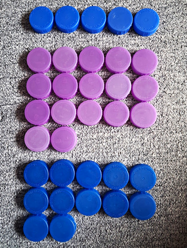 Plastic milk bottle tops - plastic,
