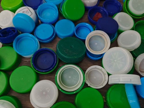Plastic milk bottle tops lids
